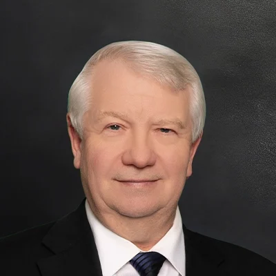 Chiropractor Stephen Dewitt Smiling In Suit