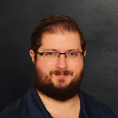 Functional Medicine Middleton WI Alexander Gorski About 01 Massage Therapist Alexander Gorski Smiling In Collared Shirt