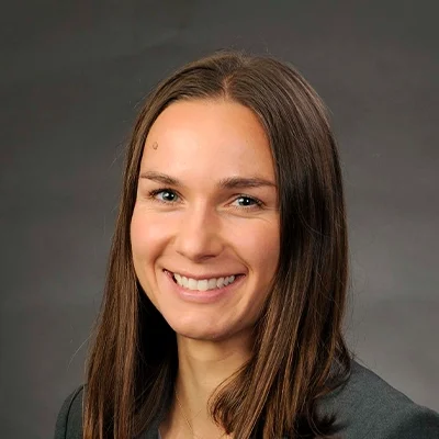 Functional Medicine Middleton WI Kara Considine About Doctor Of Physical Therapy Kara Considine Smiling In Grey Blazer